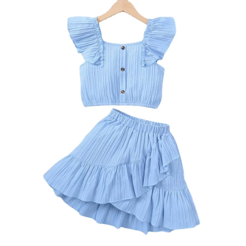 Girls’ Flutter Sleeve Crop Top and Skirt Set on Hanger
Blue Ruffle Skirt with Princess-Inspired Design
Girls Wearing Summer Party Outfit (8–12Y)